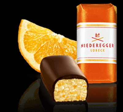 Šokolādes konfektes Marcipāns Orange 10kg (gab 12.5g) (12.2025)